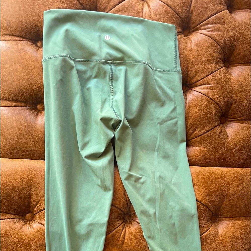 Lululemon Leggings worn once. Size 8. More of a sage green color.